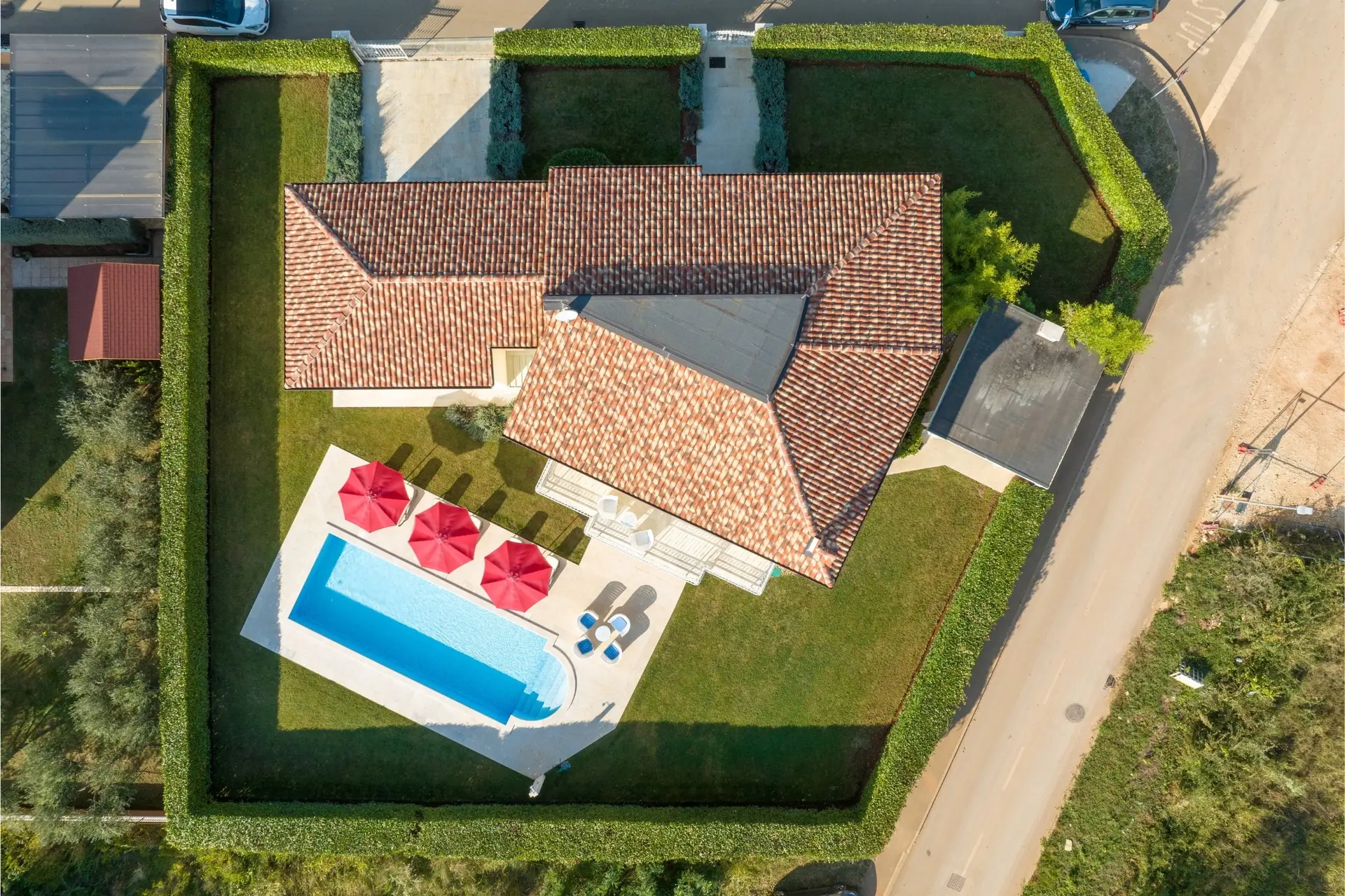 Villa Bina and its garden from above, in the village of Labinci